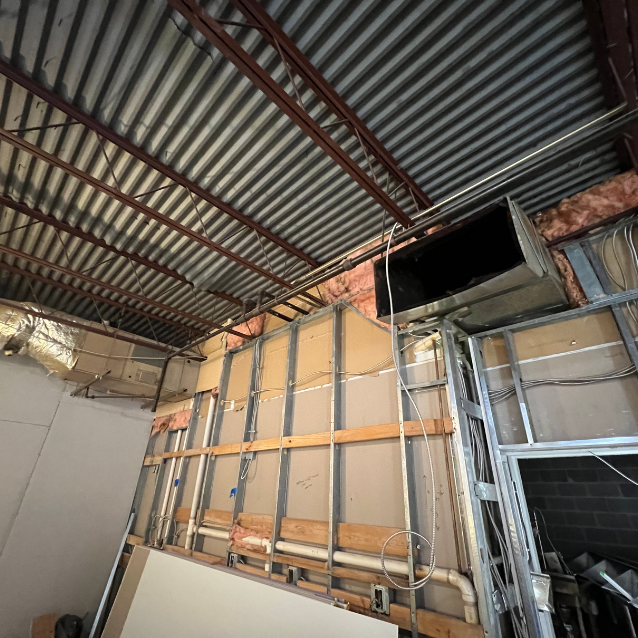 Before & After photo for double walled, 1” sound liner ductwork 